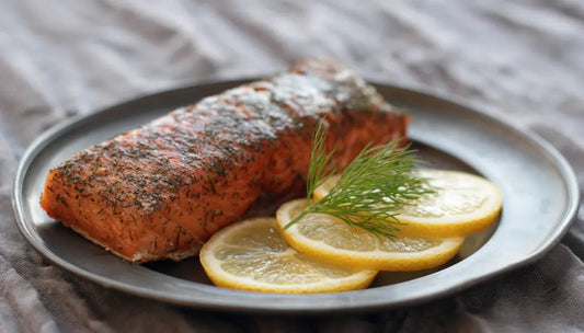 ry-cured salmon fillet with herb crust served with lemon slices and dill