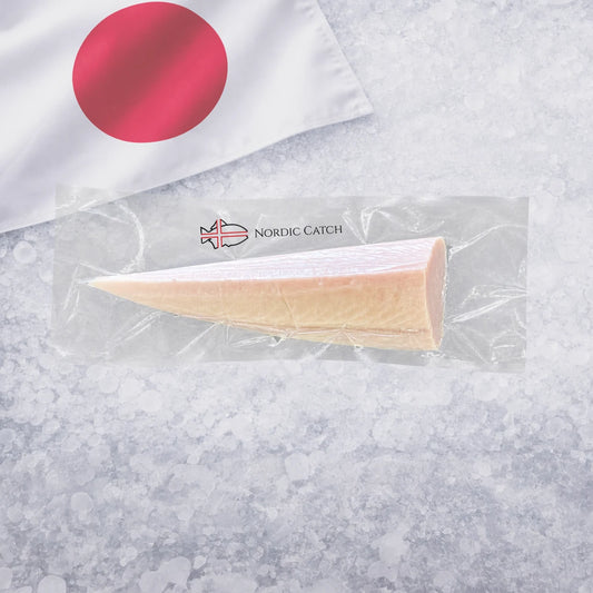 Japanese Albacore on a bed of ice with a Japanese flag in the upper left corner.