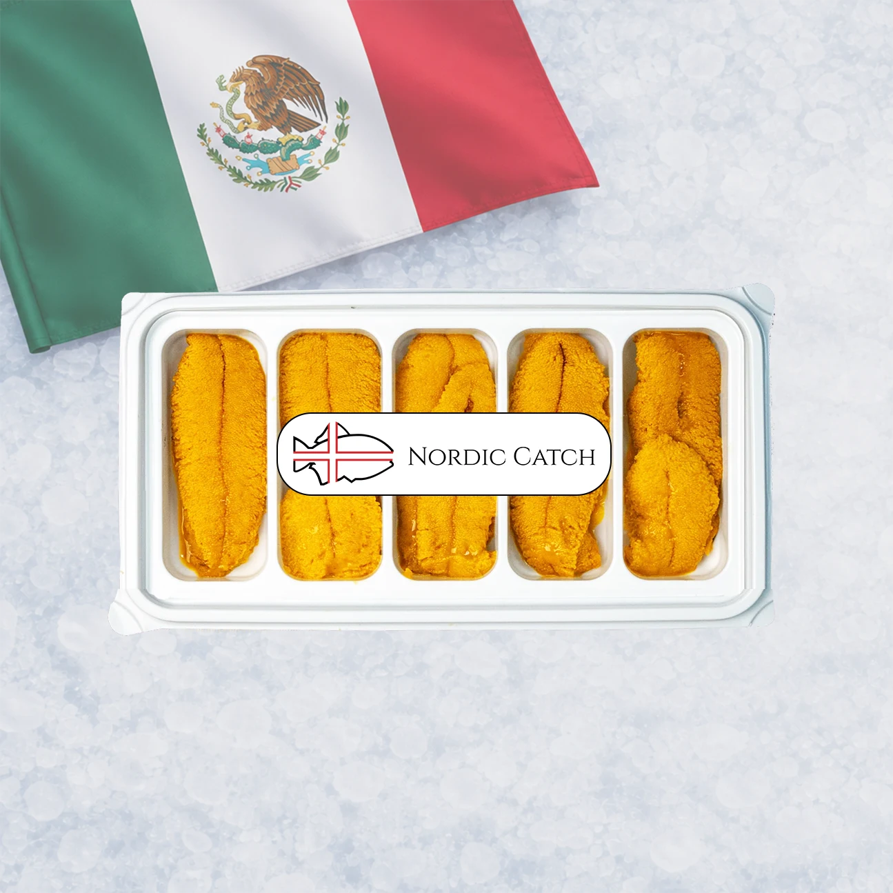 A white plastic tray containing five pieces of golden-orange raw uni, with a white label reading 'NORDIC CATCH' in the center. A Mexican flag is draped in the upper left over a light marbled surface.