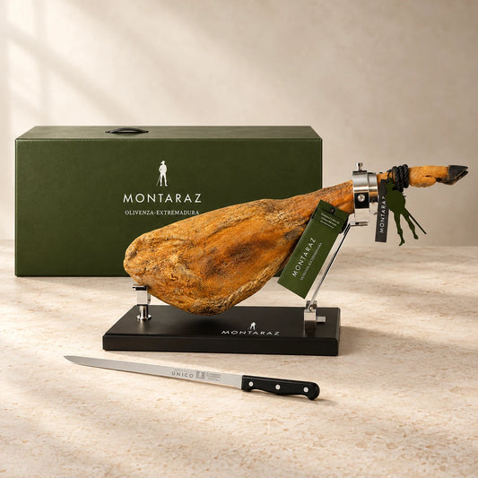 Montaraz Jamon on a black holder and a carving knife below it