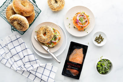 Icelandic smoked salmon sandwich with everything bagels, fresh vegetables, capers, and microgreens