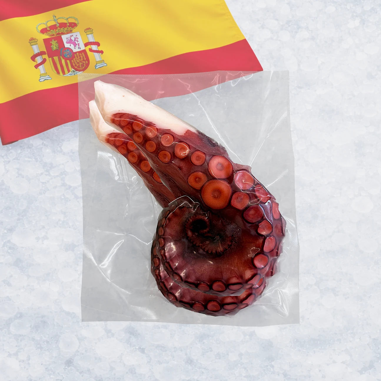 Packaged octopus tentacle with a Spanish flag in the background
