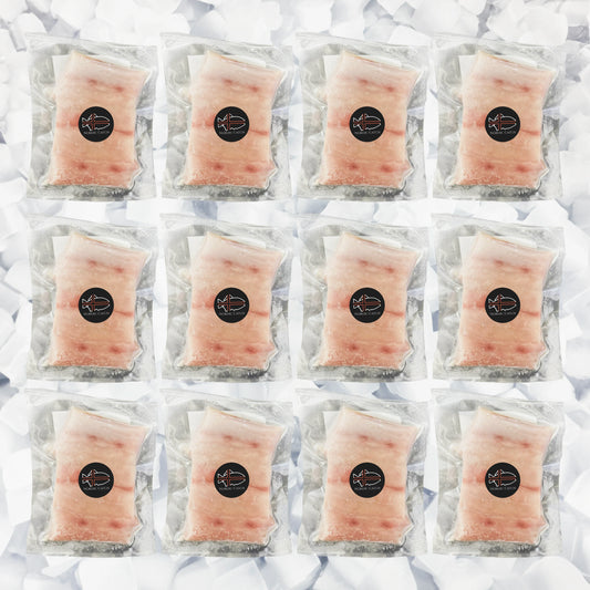 Multiple packages of Mahi Mahi raw fish with a brand logo on a white background