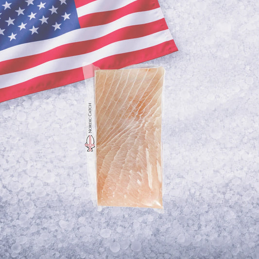 A vacuum-sealed package of raw Opah Moonfish fillets on a bed of ice, with a folded American flag in the upper left corner. The package has a vertical label reading 'NORRIS CATCH'.