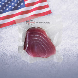 Yellowfin tuna loin package on crushed ice with American flag and Nordic Catch branding